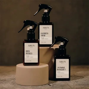 AIKUN Refillable Brown Glass Fabric Fine Mist Trigger Perfume Freshener Vessel Room Spray Bottle for Home Hotel Linen Care