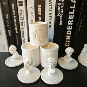 Artistic statue style portrait scented candle in a plaster cup featuring a human figure for home decoration