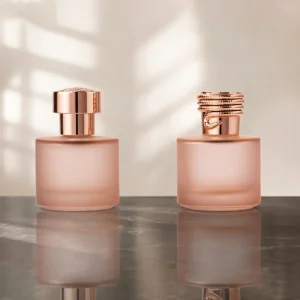 Custom Pink Cylindrical 30-100ML Frosted Women’s Glass Perfume Bottle with Aluminum Pump and Leak-proof Luxury Cap