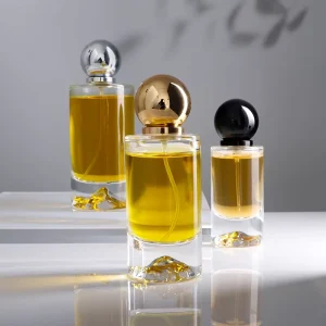 Luxury Empty 30ml 50ml 100ml Cylindrical Clear Glass Perfume Spray Bottle with 3D Mountain Embossed Base & Colorful ABS Ball Cap