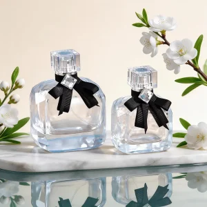 Luxury New Design 80ml Custom Matte Engraving Delicate Transparent Perfume Spray Glass Bottle with Black Bow and Lid 100pcs MOQ